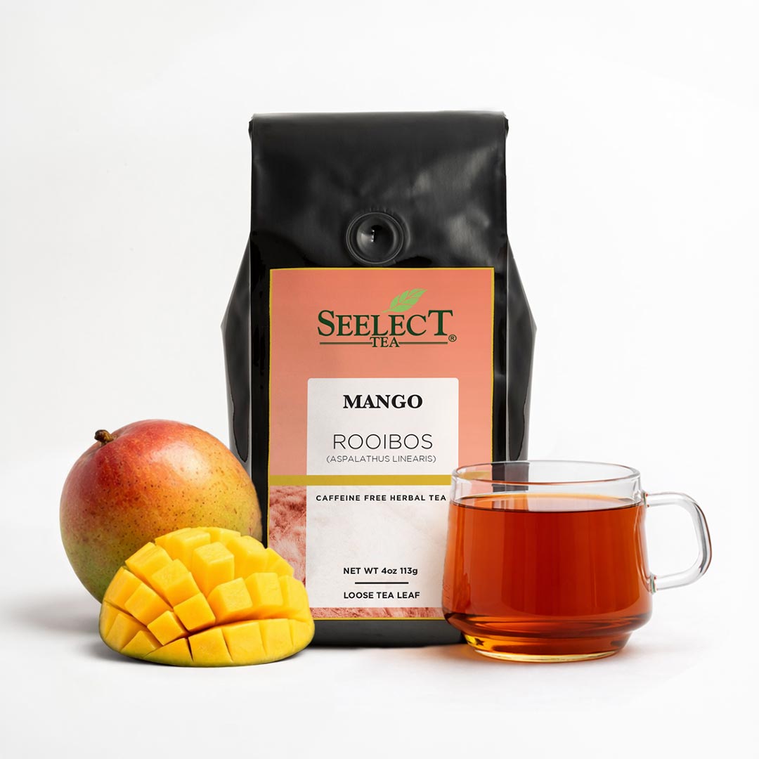 Seelect Tea Mango Rooibos package with a mango and a cup of tea on a white background
